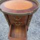 Oval bedside table in Louis XV style with marquetry.