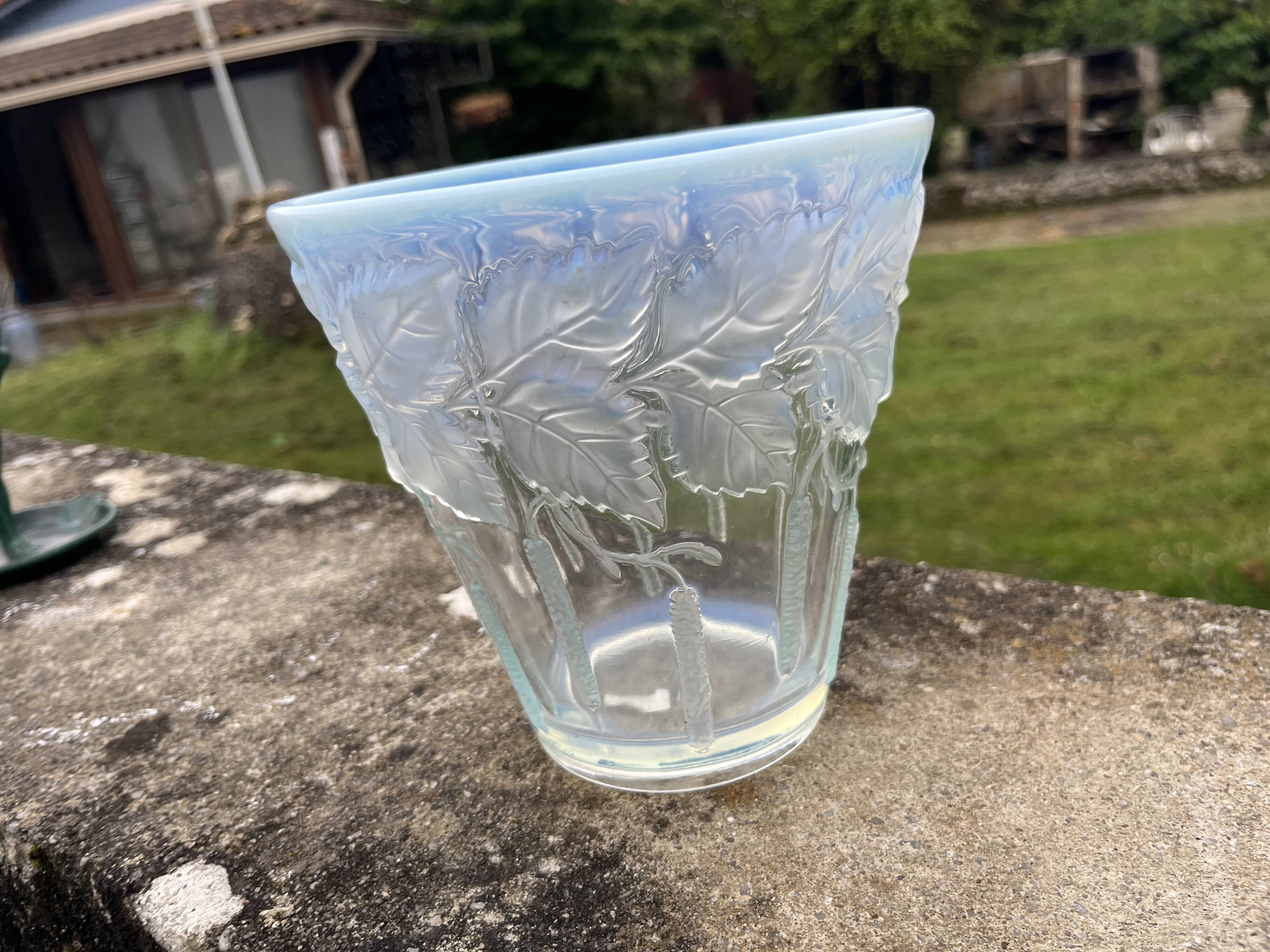 Opalescent glass vase moulded with leaf and catkin decoration – in the style of Lalique.