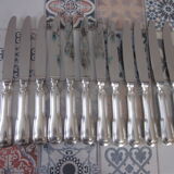 12 silver metal knives