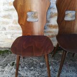 Eight mismatched bistro chairs