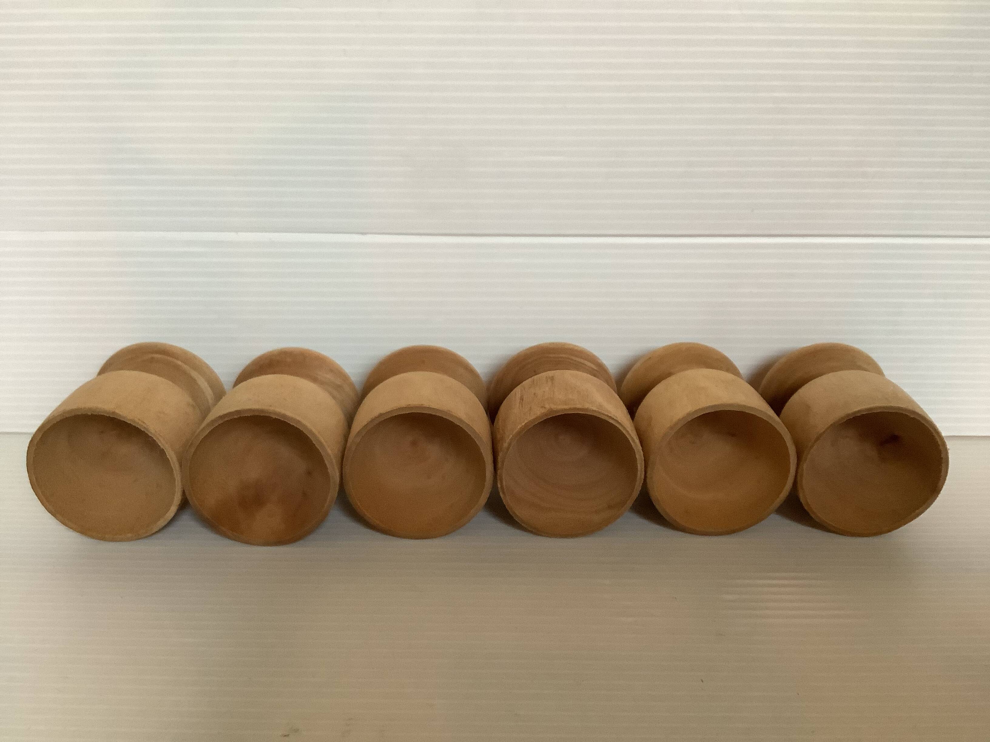 Six wooden egg cups