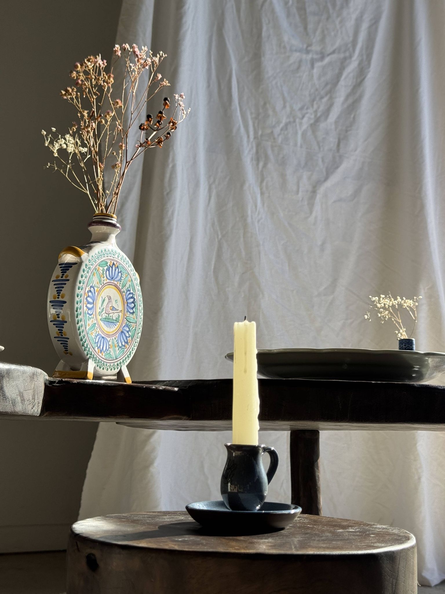 Vintage hand-held candlestick in blue glazed stoneware with floral decoration by Poterie Millian.