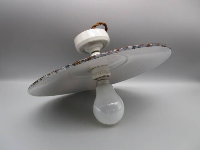 Old pendant light in speckled gray enameled sheet metal