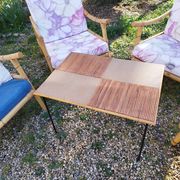 4 bamboo armchairs and a vintage coffee table