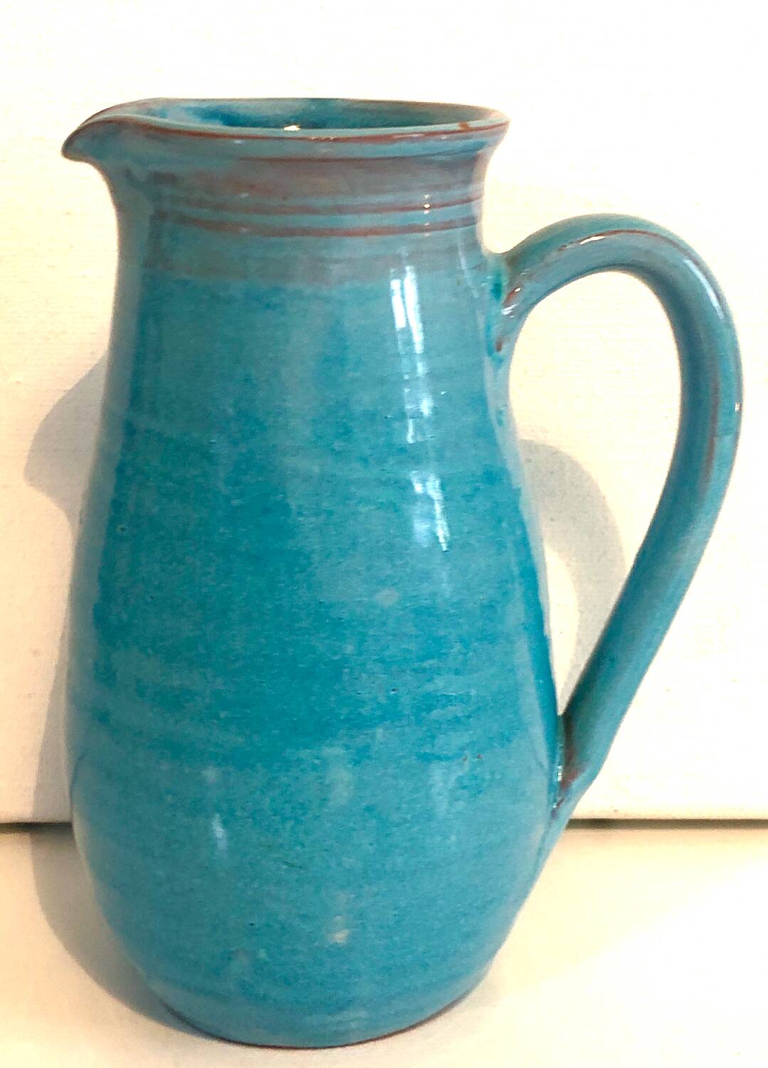 Blue ceramic pitcher
