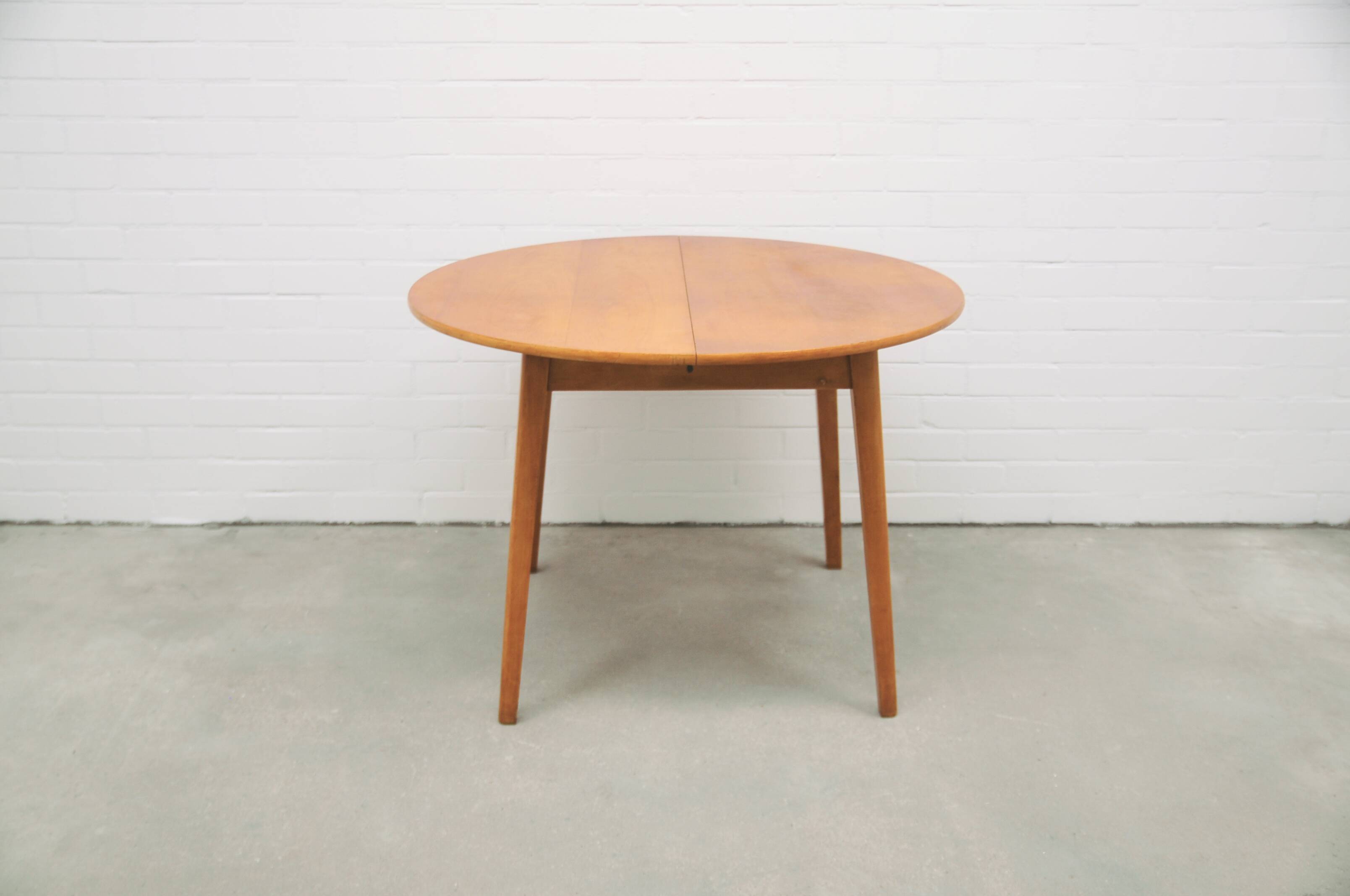 vintage round fold-out dining table