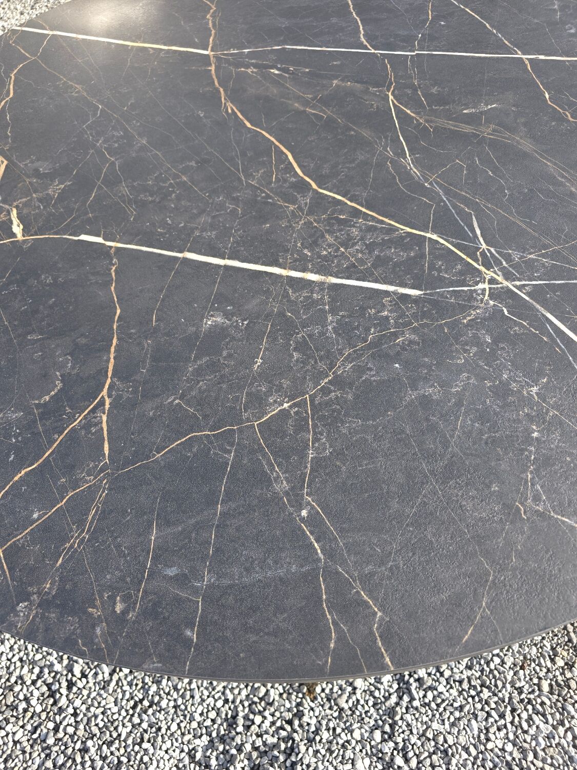 Bistro pedestal table with cast iron base and marble effect top