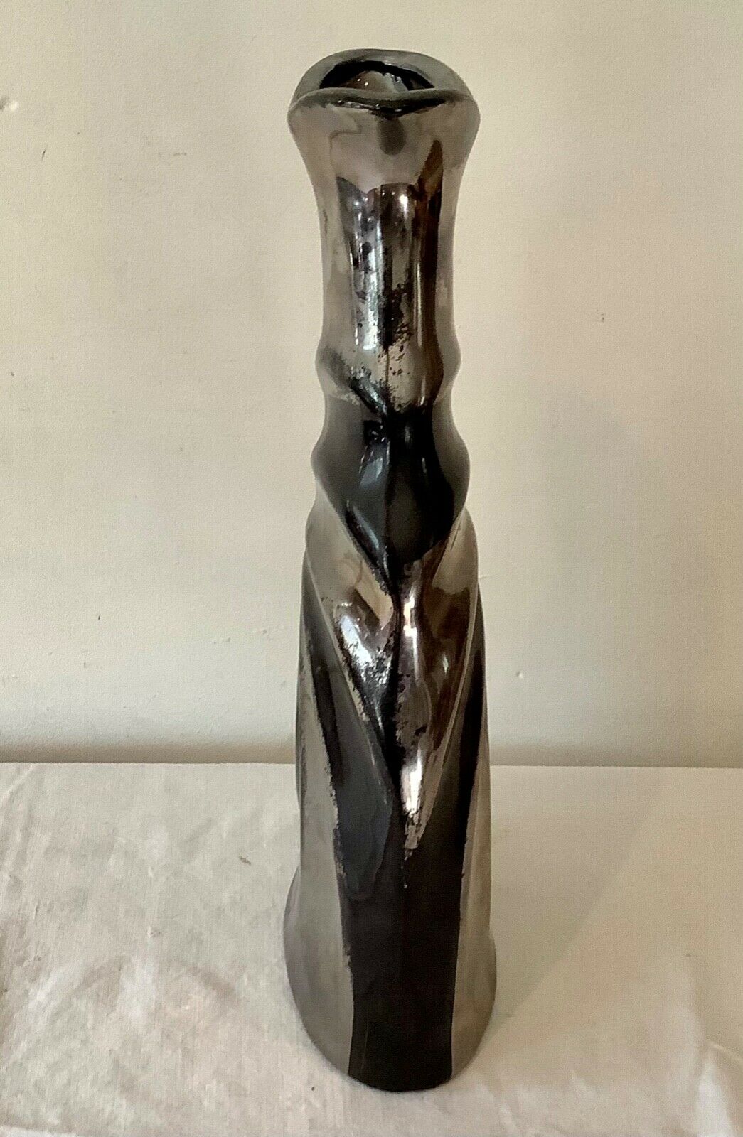 Vintage vase in silver and black lace-up earthenware stamped