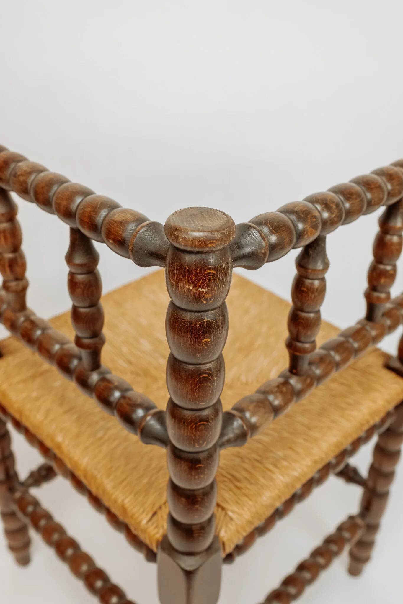 Classic vintage bobbin corner armchair