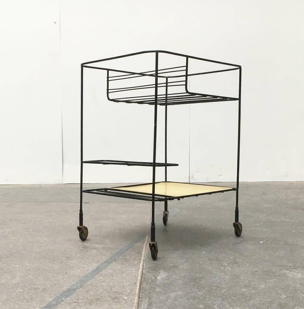 Minimalist perforated metal serving trolley in mid-century style, 1960s.