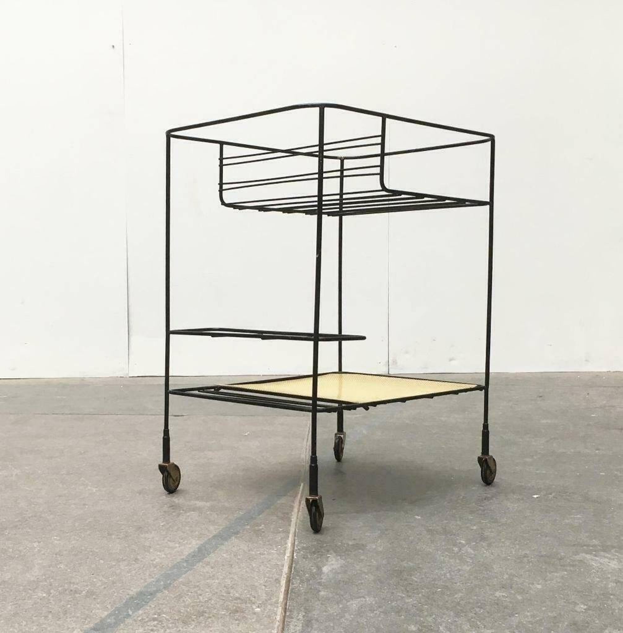 Minimalist perforated metal serving trolley in mid-century style, 1960s.
