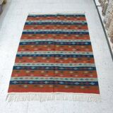 Authentic handmade Tunisian Berber kilim rug in orange wool.