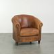Aged sheepskin clubchair with beautiful vintage patina and comfortable seat