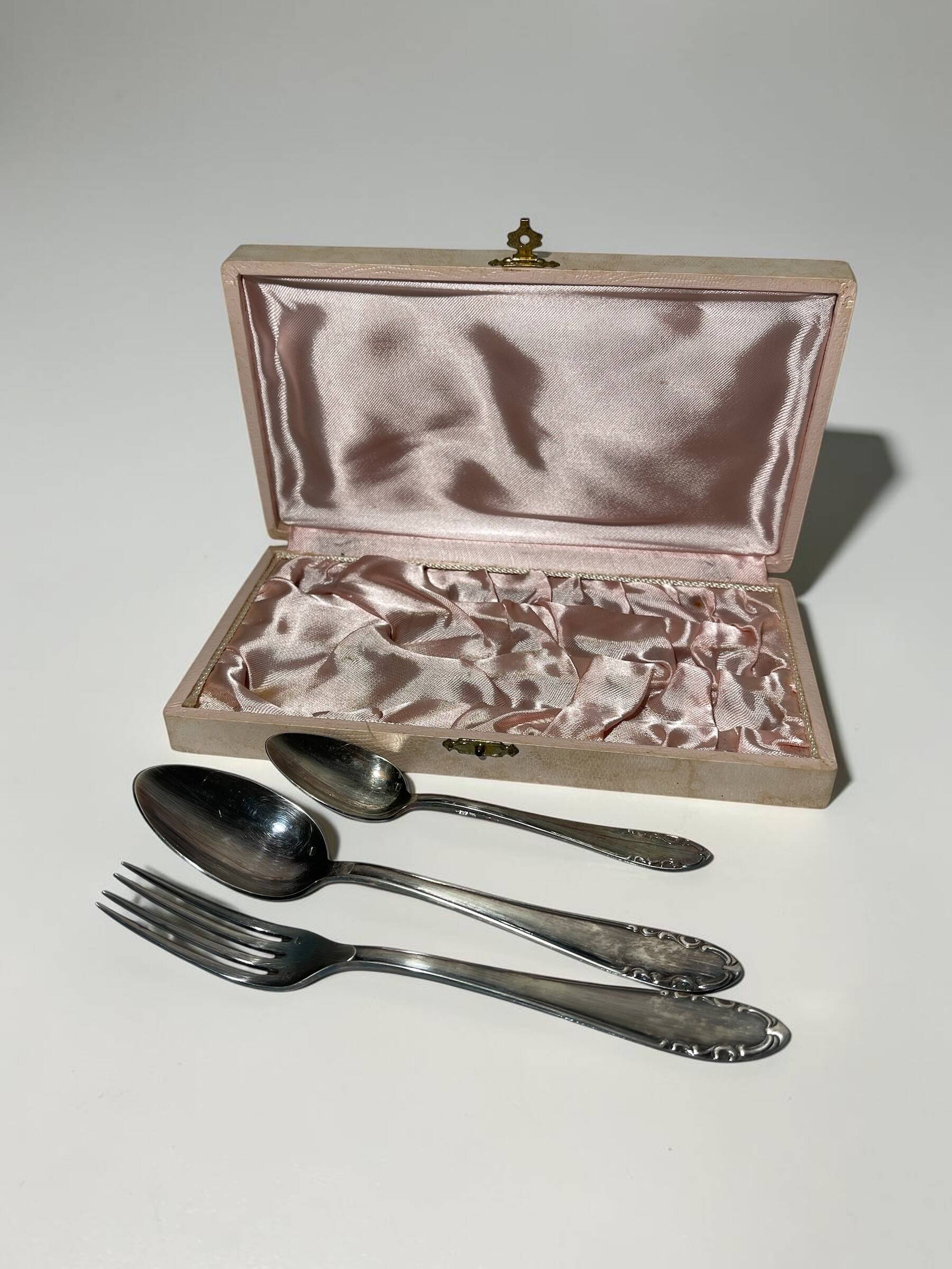 Set of antique silver-plated cutlery for children.