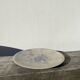 Ethnic handmade round fish dish