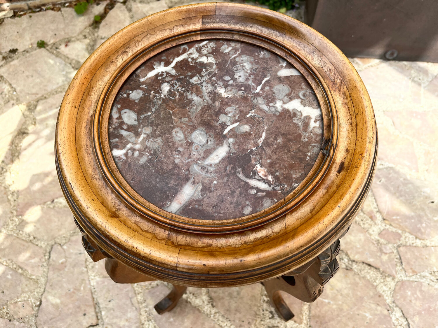 Old harness in wood with marble top
