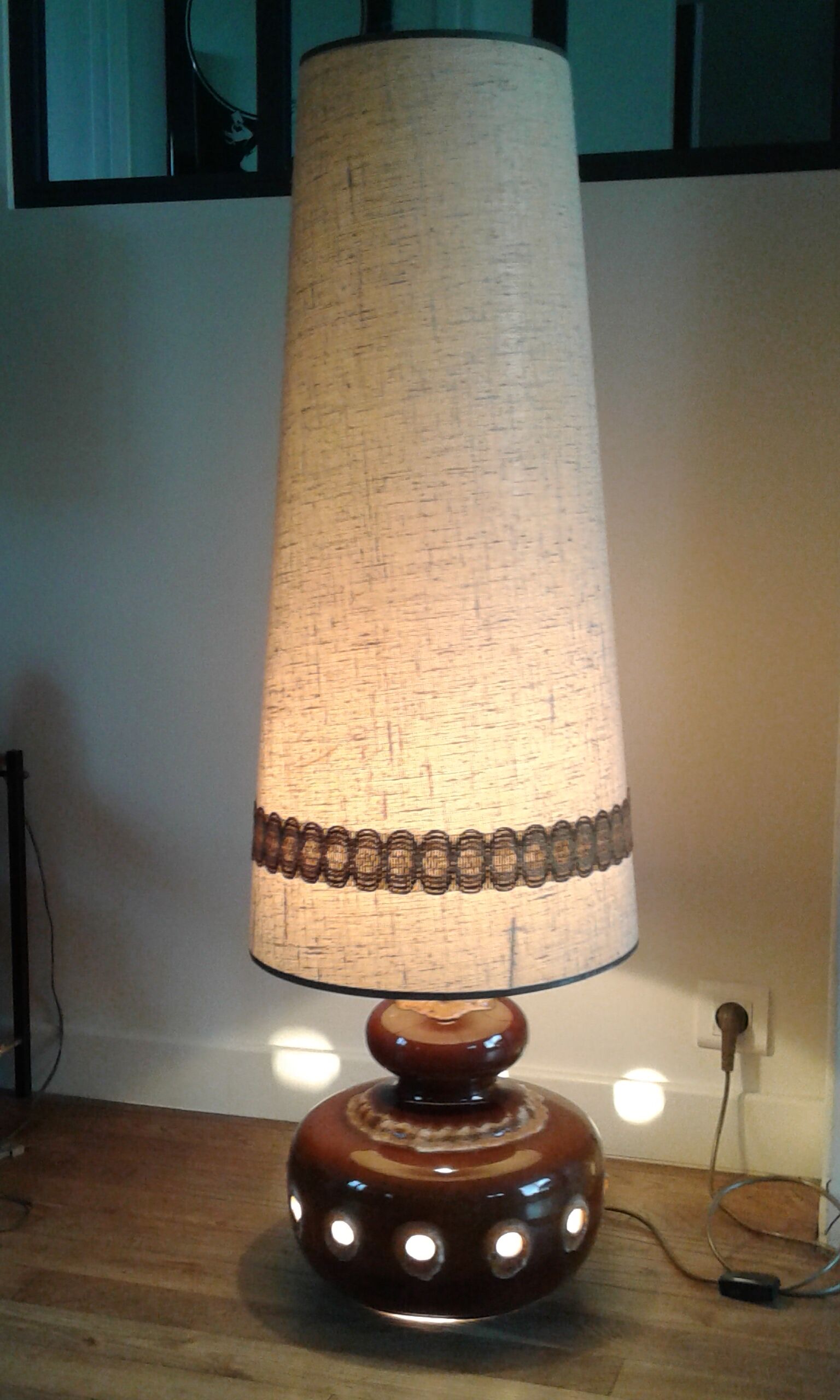 Floor lamp with Fat Lava ceramic foot and fabric lampshade.