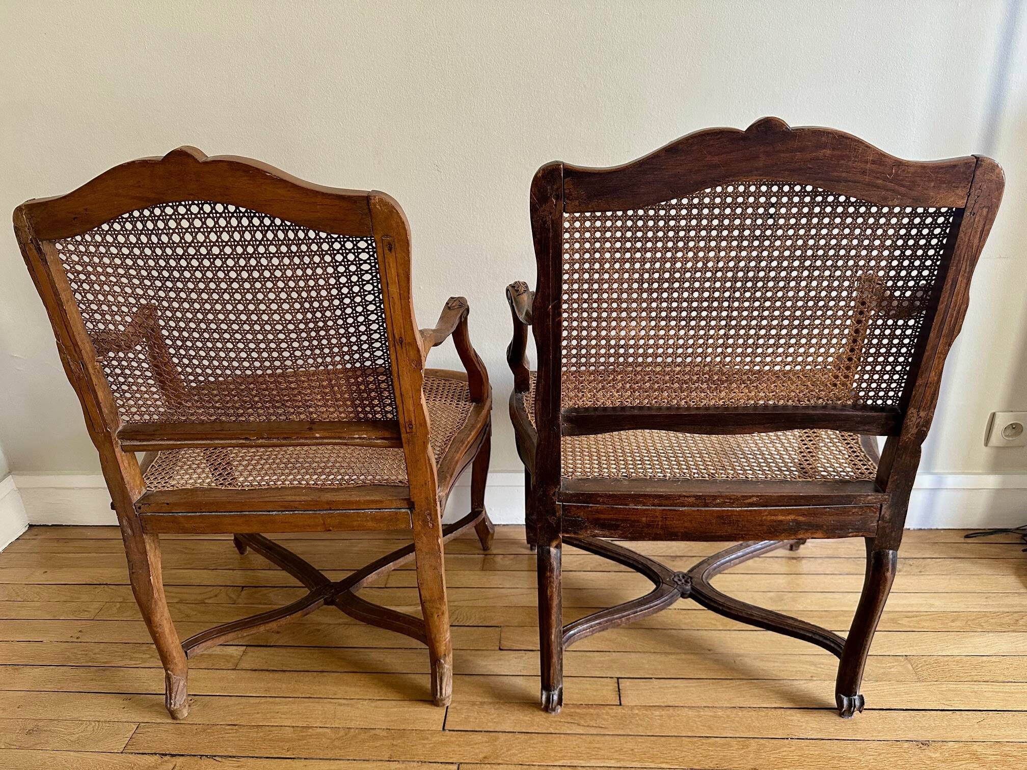 A pair of Regency armchairs with a stretcher.