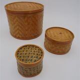 Trio of rattan boxes