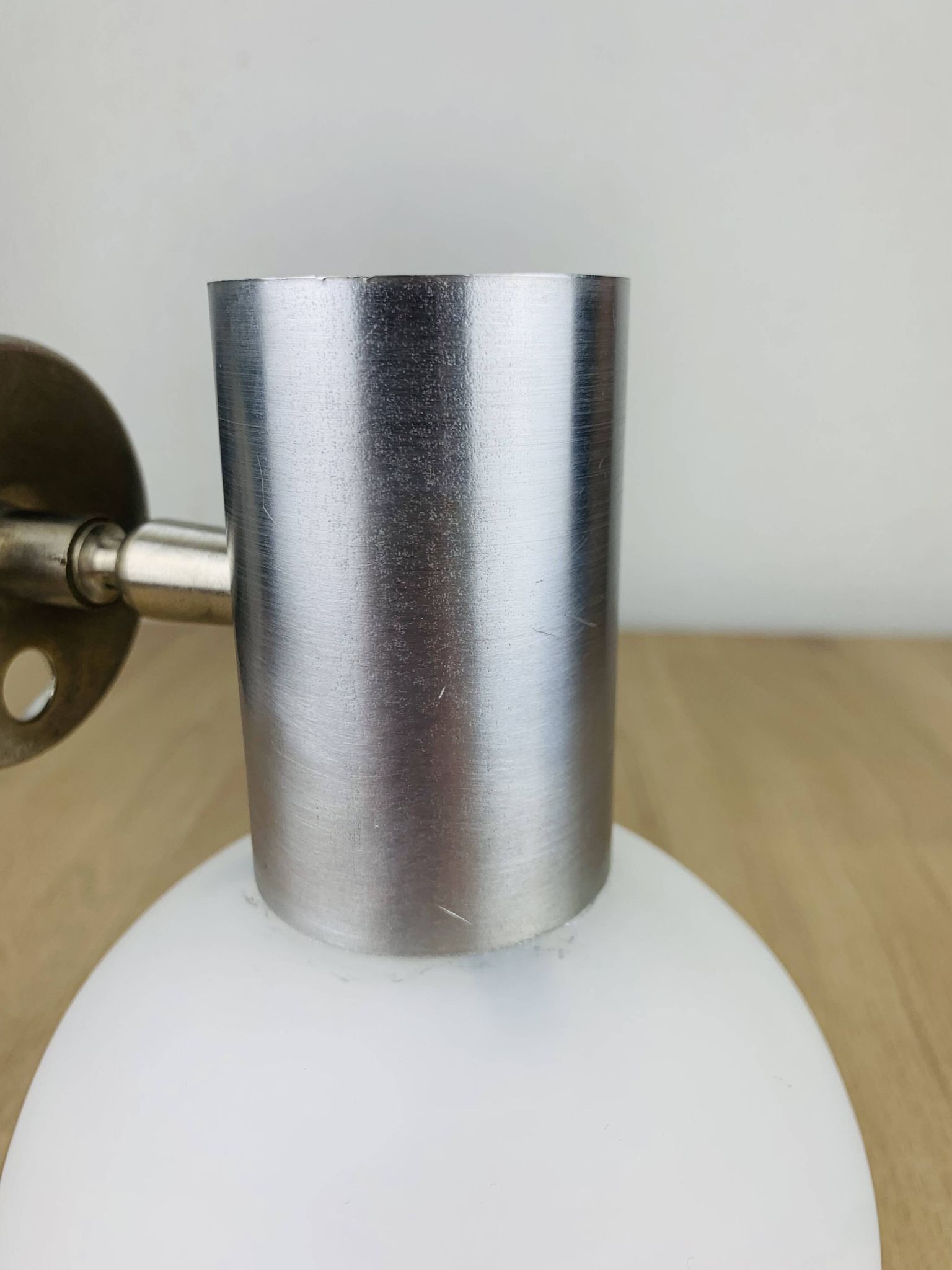 Space age opaline globe wall light, adjustable, and brushed metal, 1960s.