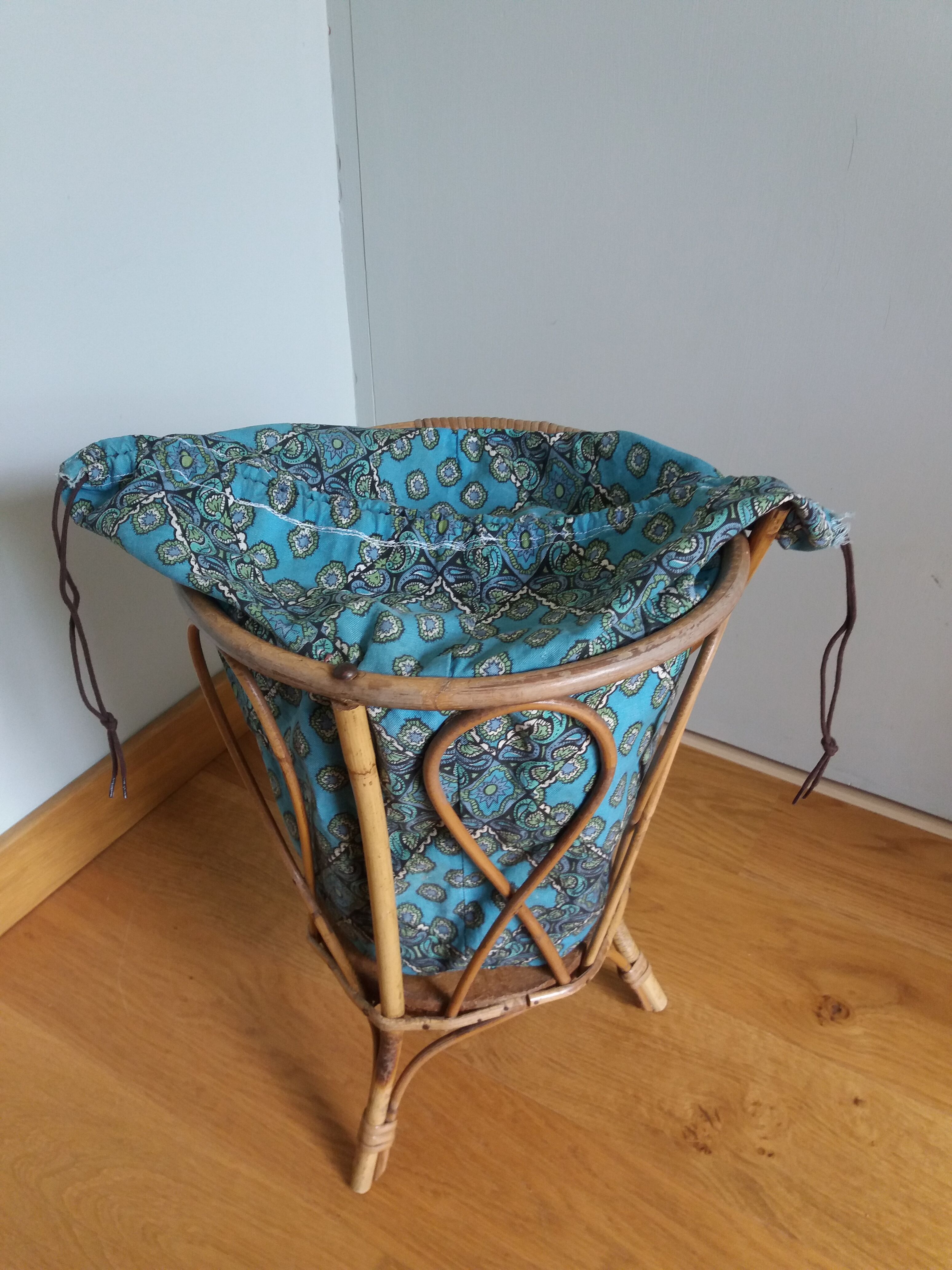 Wicker worker round basket with work, knitting