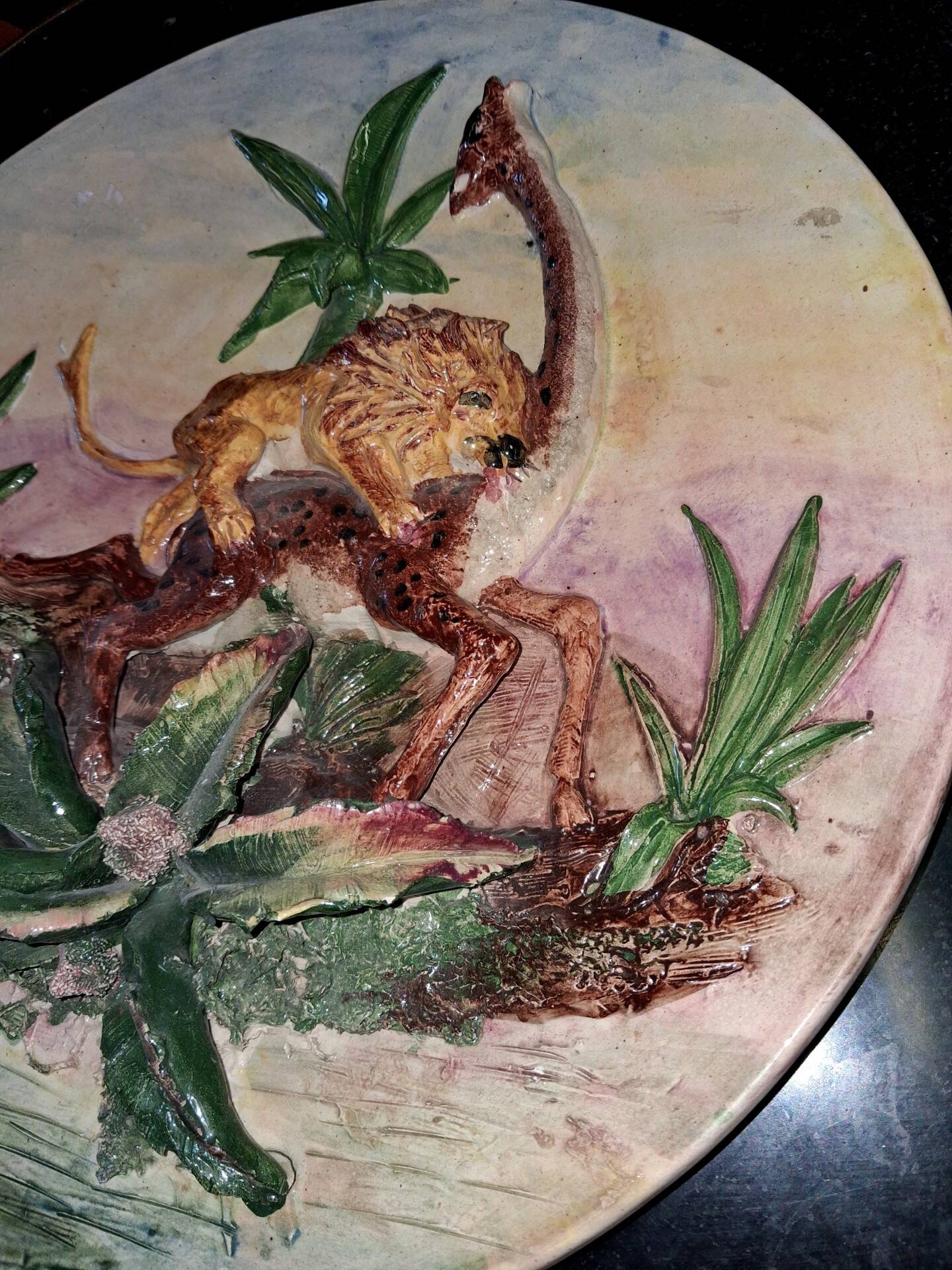 Large wall plate in ceramic with relief decoration
