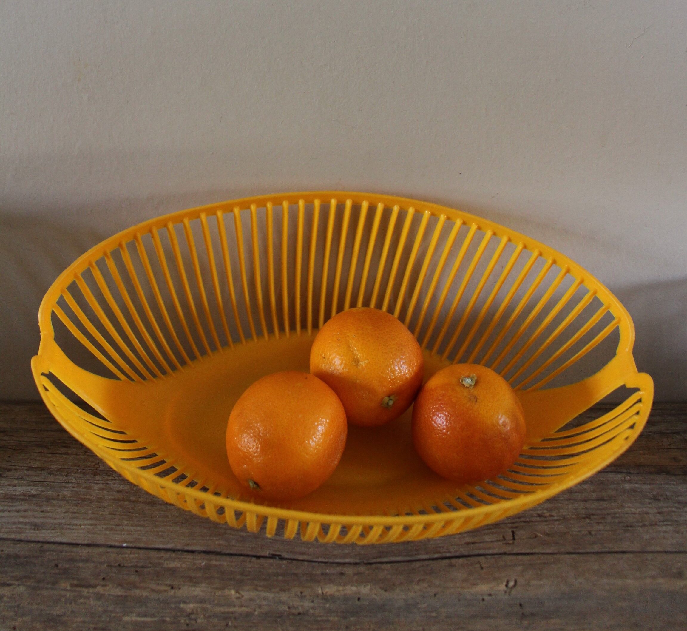 Vintage plastic orange yellow oval basket