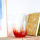 Vintage blown glass vase with a speckled red design