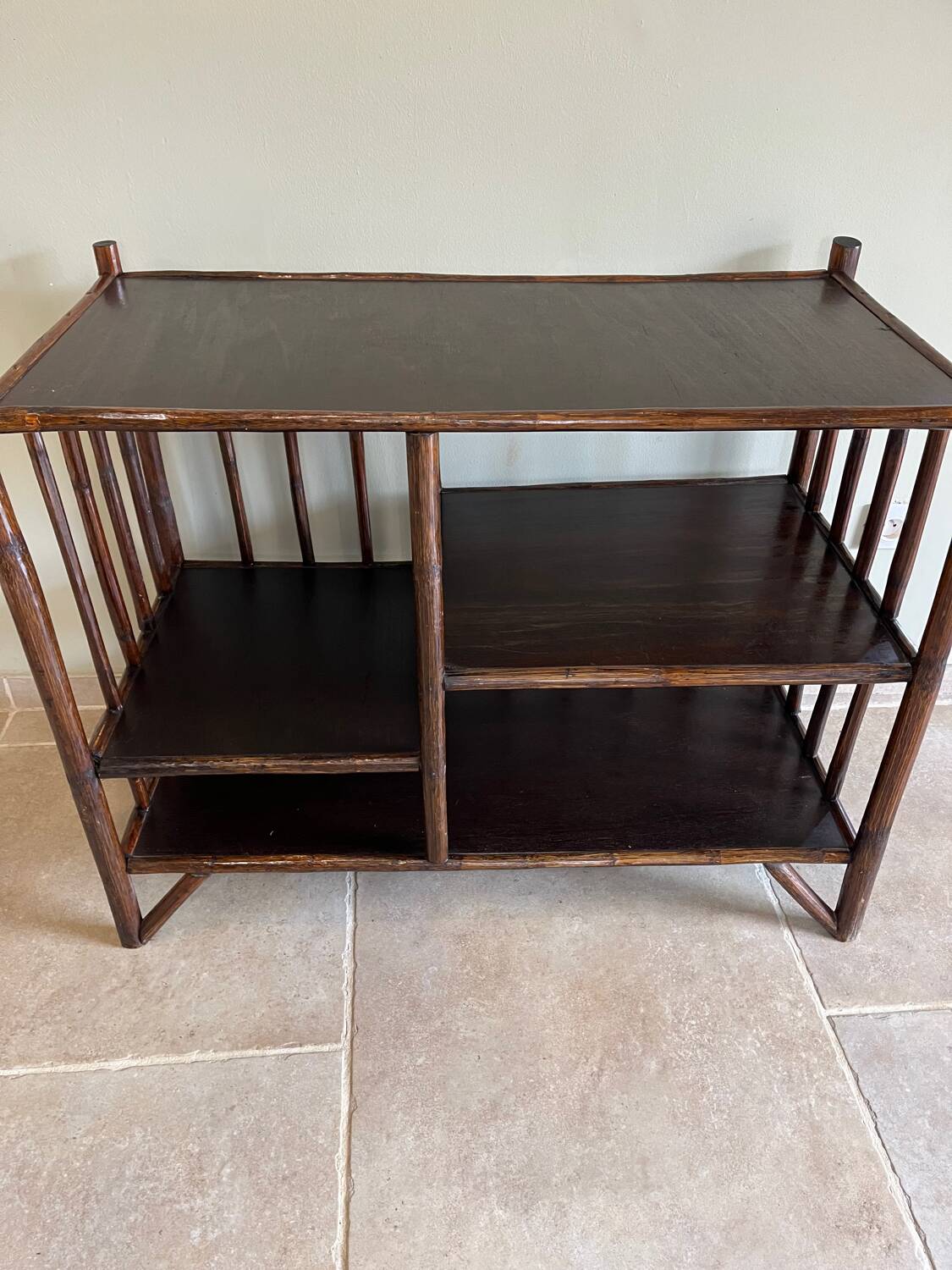 Brown rattan console shelf