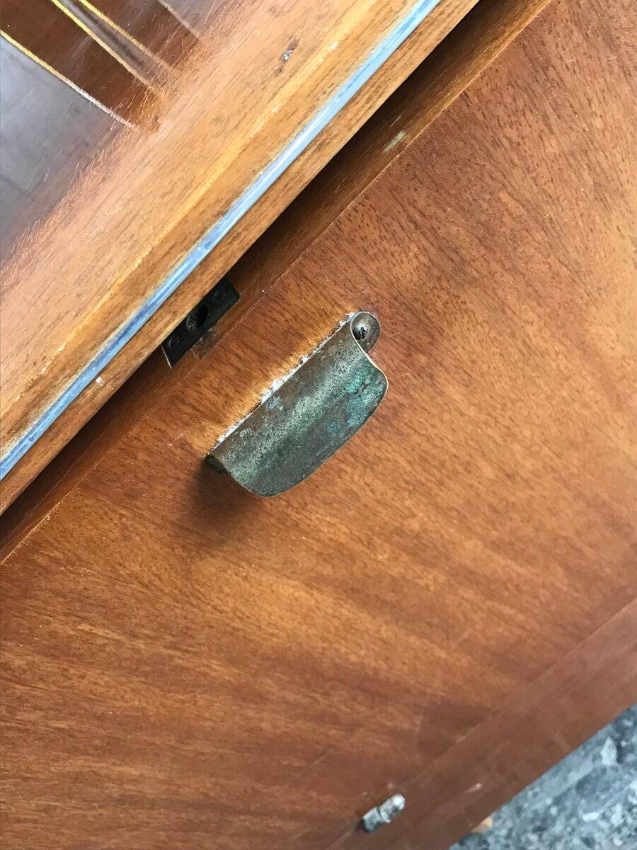 Art Deco bar cabinet in brown walnut with integrated lamp and three sockets, 1950s.
