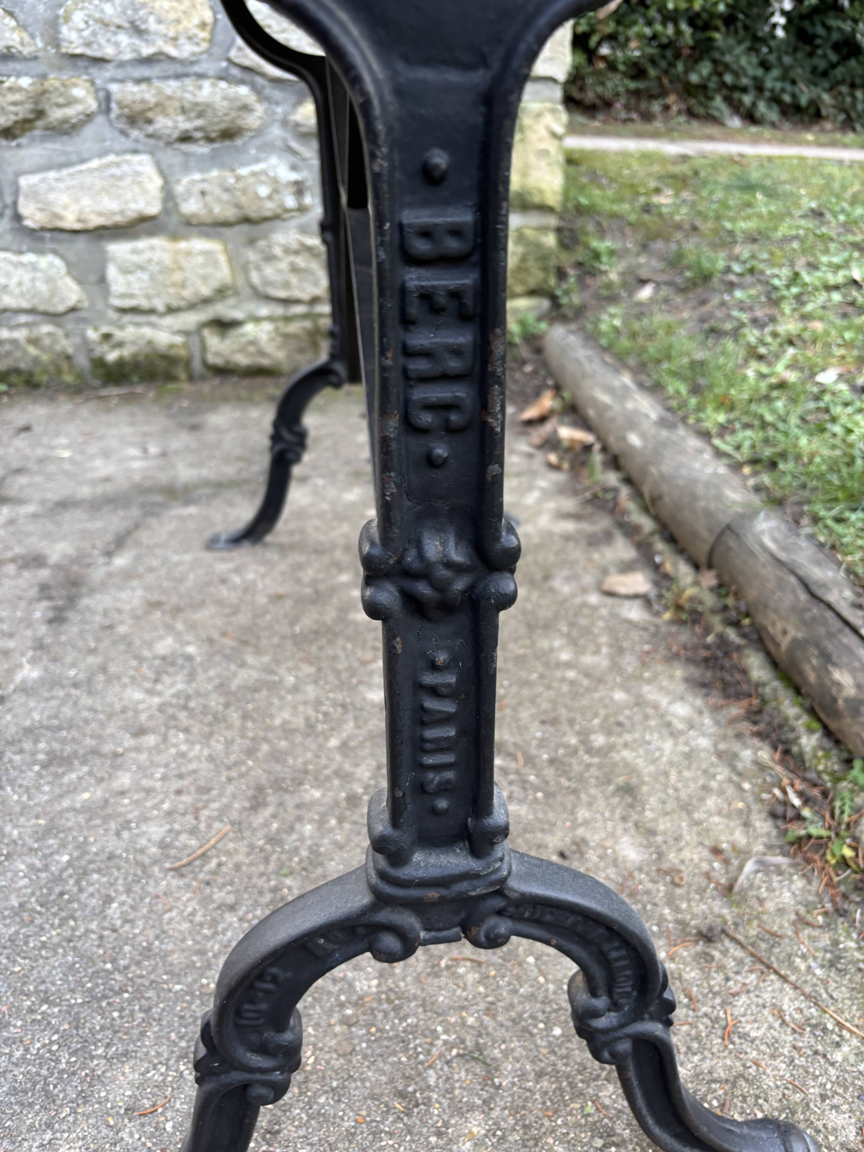 Old bistro table by Berc in Paris. Wrought iron, marble top.