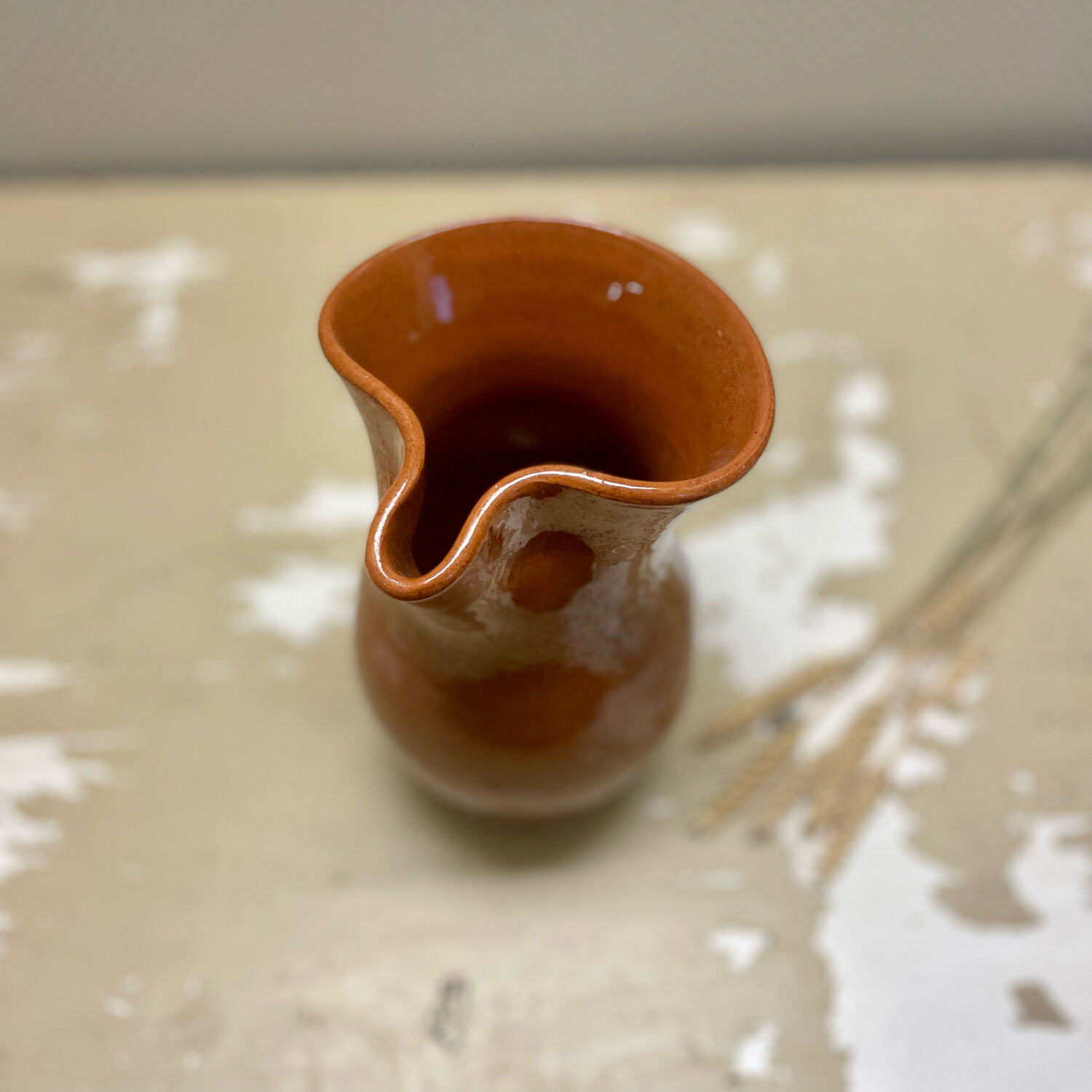 Vintage glazed terracotta pitcher