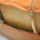 Sofa "space age". Leather, fiberglass, foam, steel. Circa 1970. Orange.