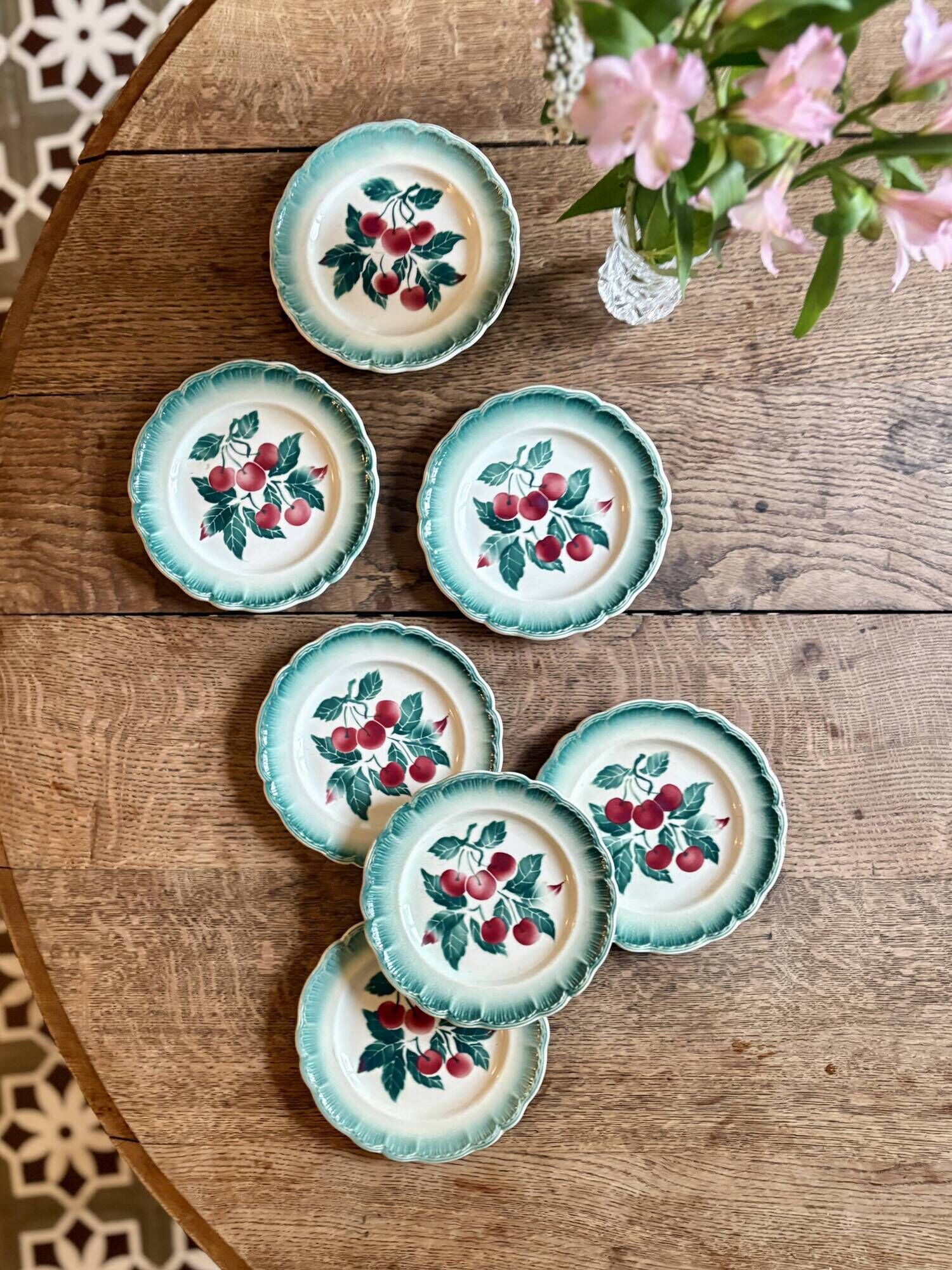 Set of 7 vintage Badonvilier dessert plates.