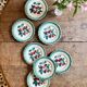 Set of 7 vintage Badonvilier dessert plates.
