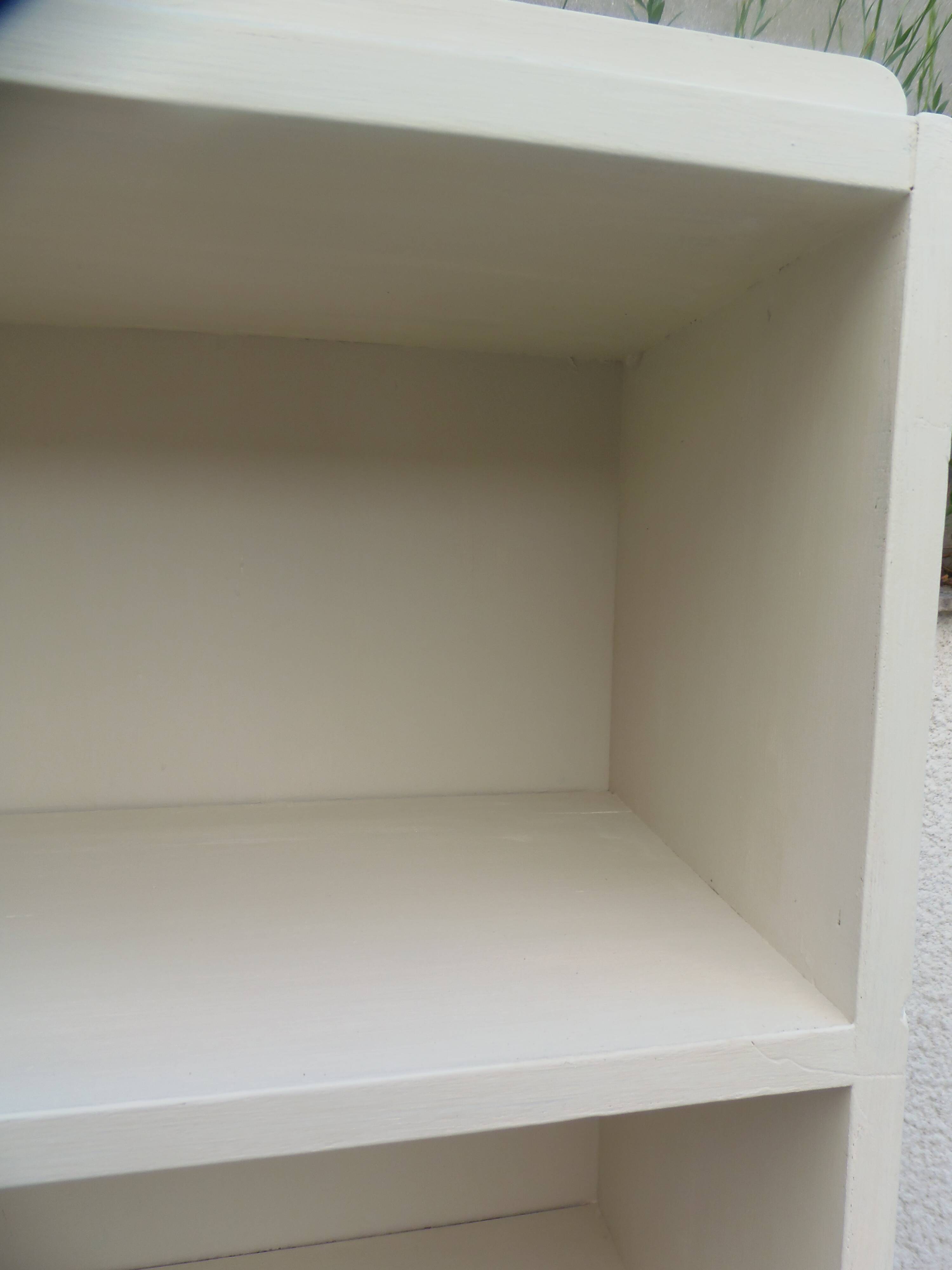 Renovated vintage 1950s library in beige.