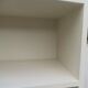 Renovated vintage 1950s library in beige.