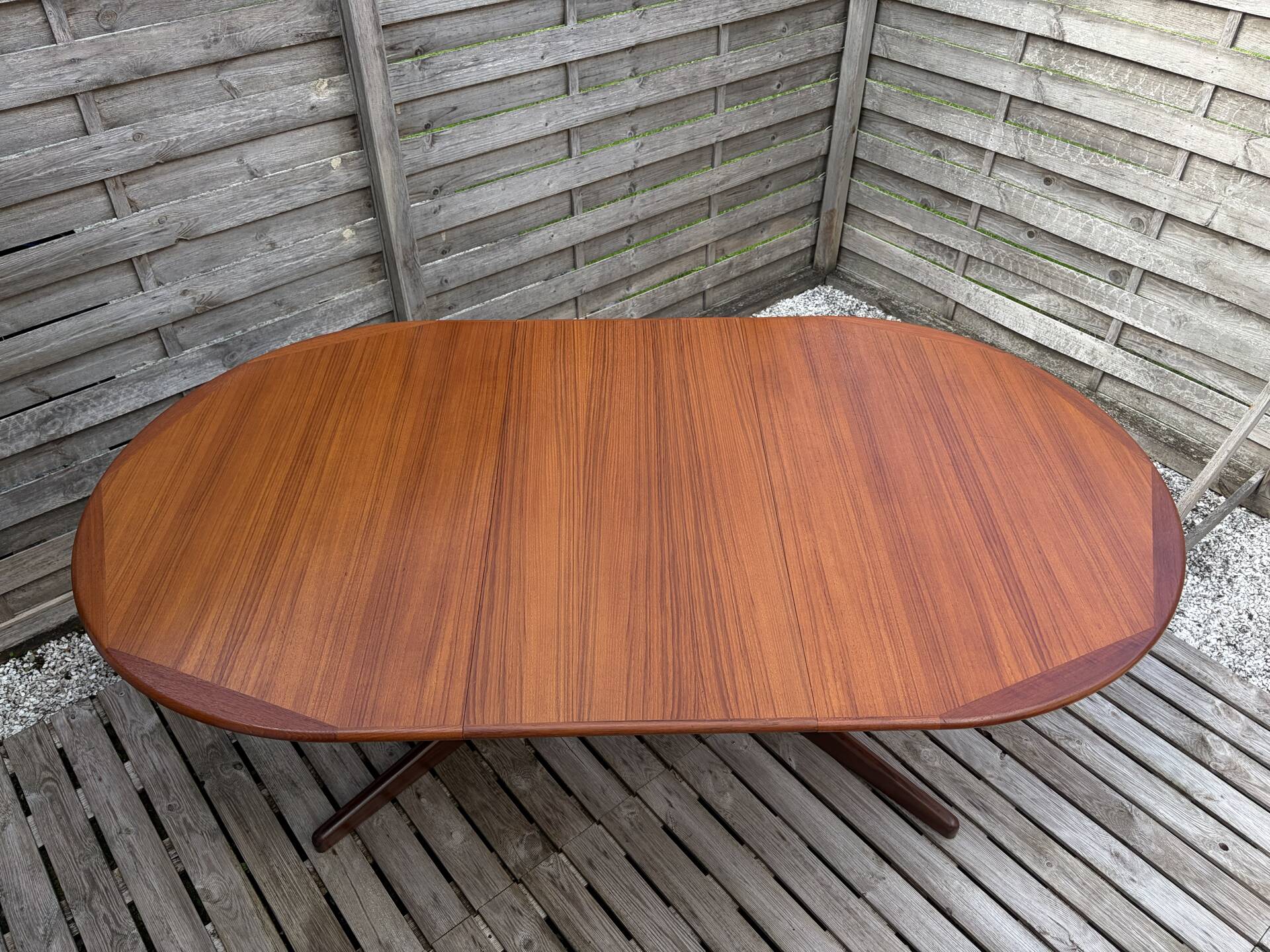 Oval teak table extendable with two leaves, Baumann style.