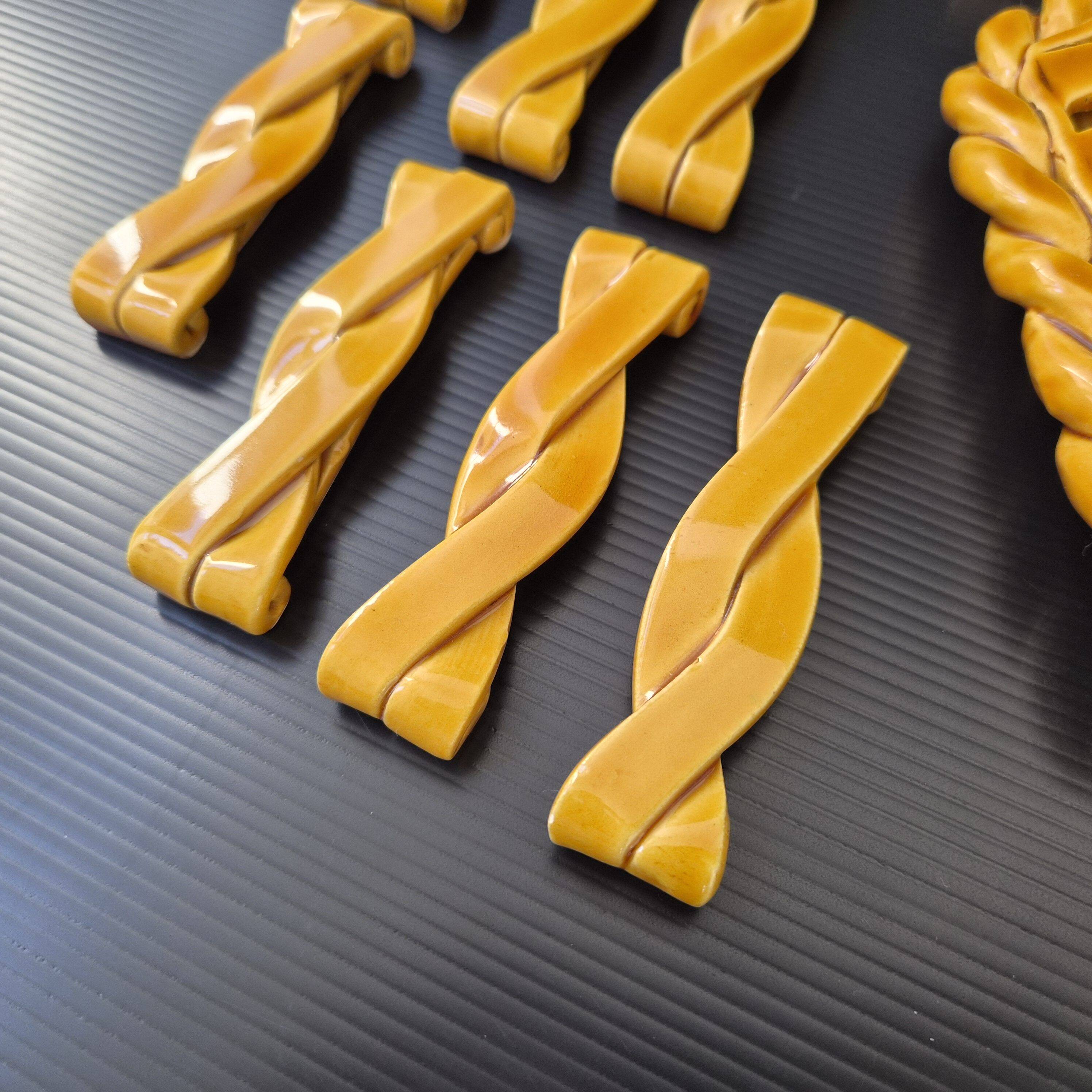 Vallauris trivets, knife holders and bottle coasters