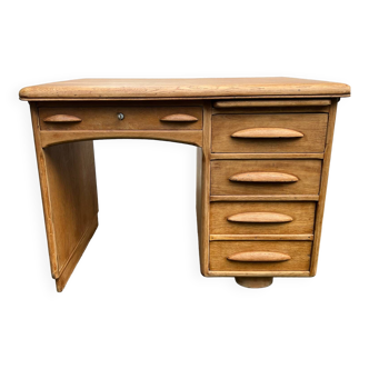 Antique light oak desk from the 1950s with 4 drawers