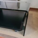 Curved glass coffee table