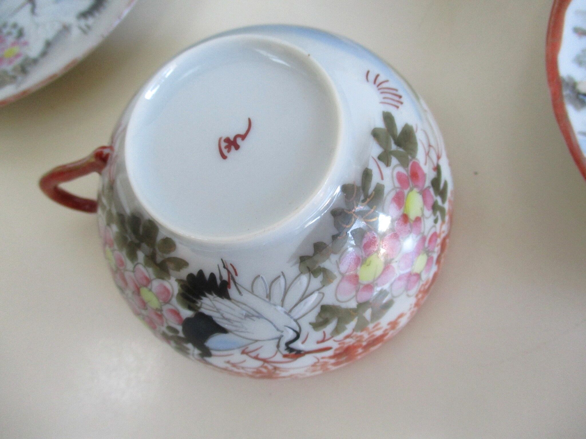 Antique cups and under cups porcelain japan