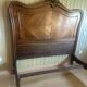 Very beautiful antique double bed in Louis XV style, made of wood and walnut veneer.