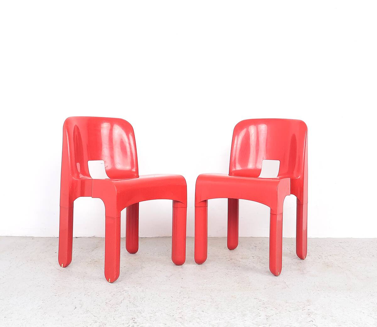 Joe Colombo red universale chairs for Kartell, 1960s