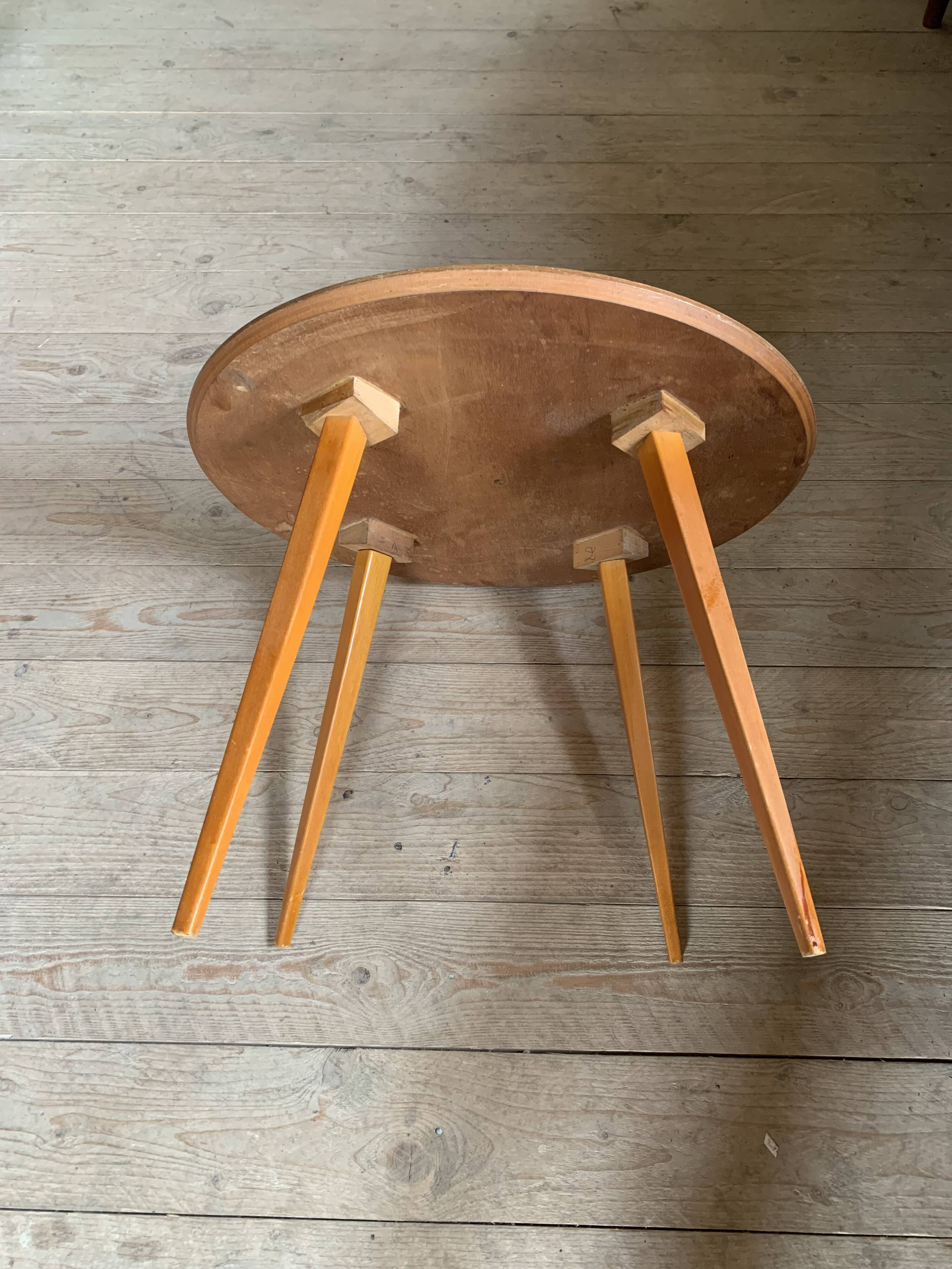 Round coffee table with compass base