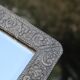 Oriental mirror in chiseled metal – beveled, for placing on a surface or hanging