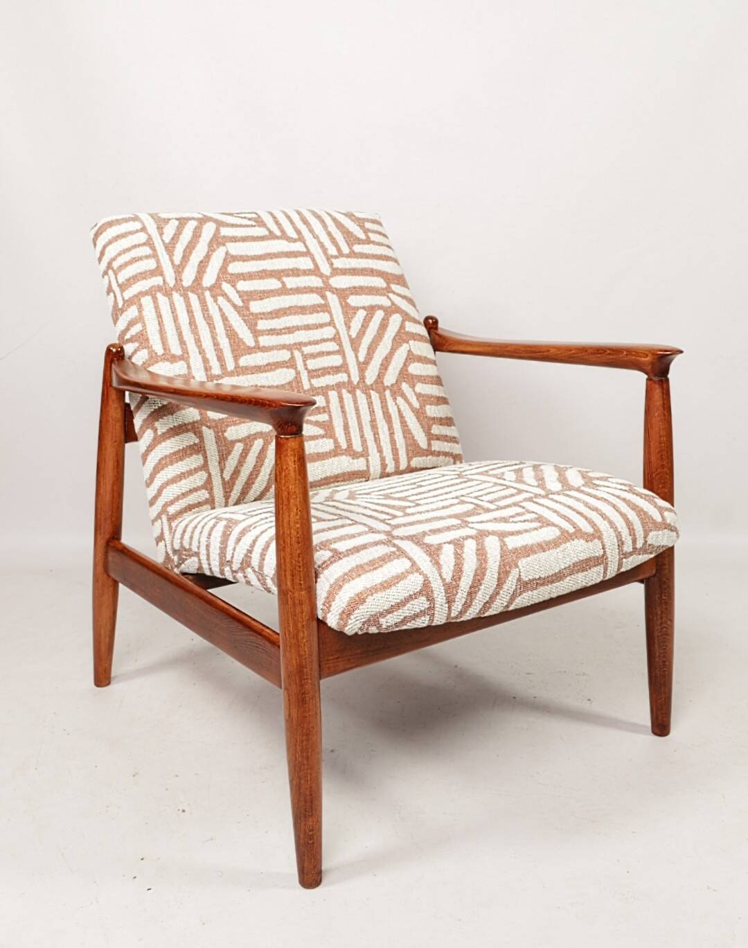Mid-century modern armchair in coral red jacquard by E. Homa
