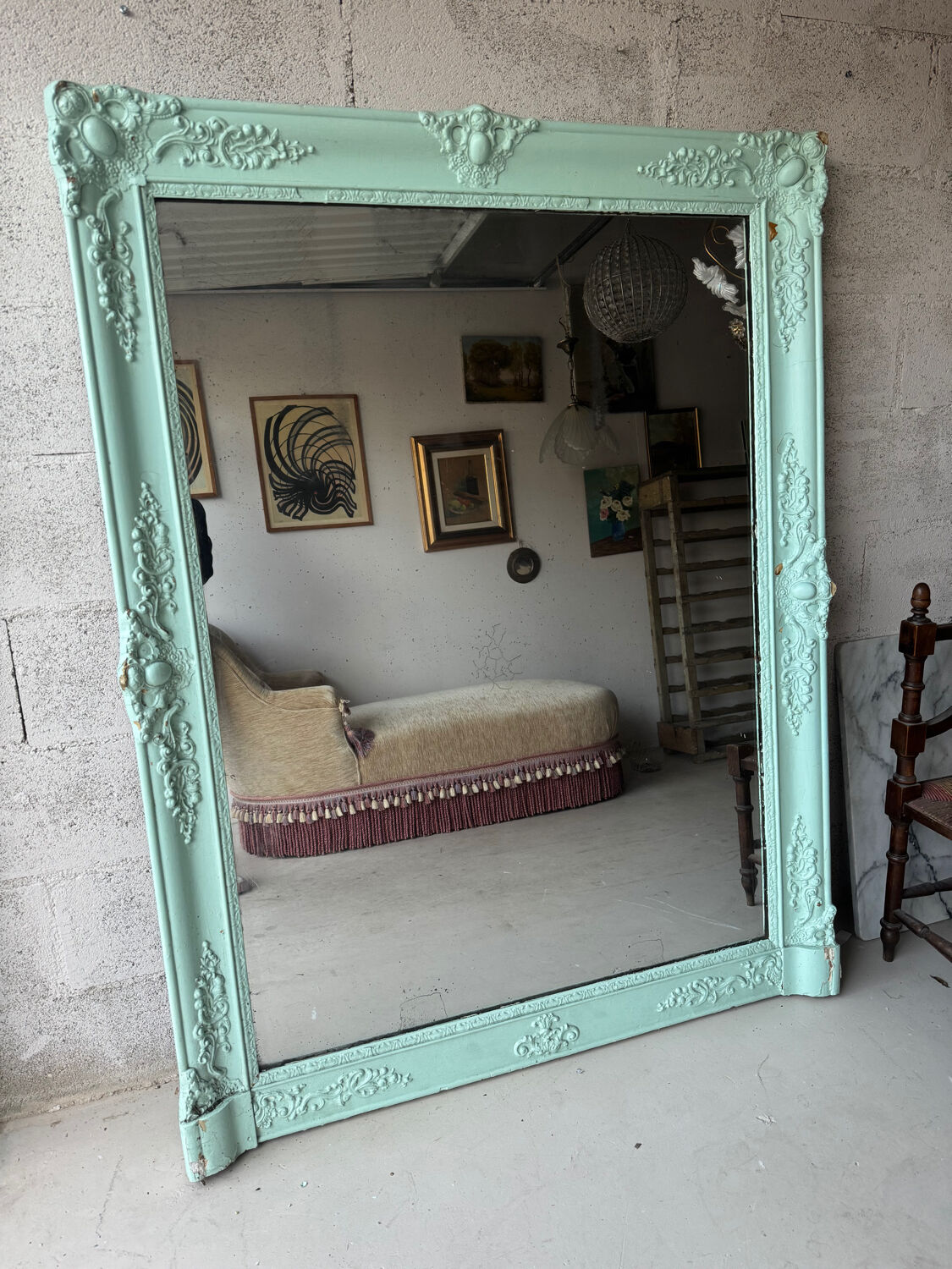 Large antique mercury mirror, patinated blue sculpted frame.