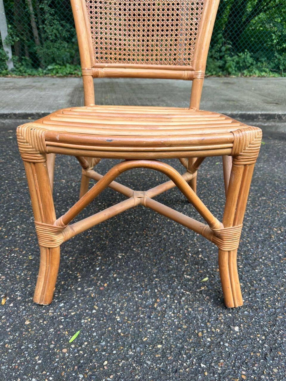 2 rattan and caned chairs in colonial bistro style from the 1990s.