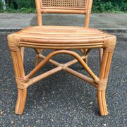 2 rattan and caned chairs in colonial bistro style from the 1990s.